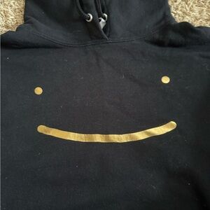 Black Hoodie with Gold Smiley Face DREAM MERCH
